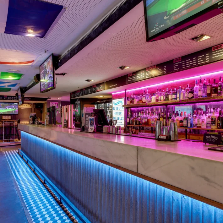 Belushi's Barcelona sports bar on Carrer de Bergara showing massive digital screens for watching the World Cup live near Plaça de Catalunya