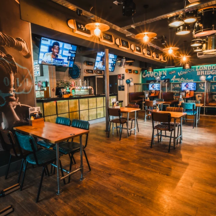 Belushi's Greenwich sports bar venue showing TV screens and booths for watching the World Cup li