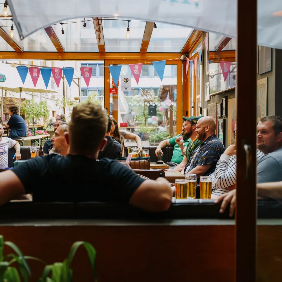 Football fans watch the world cup at belushi's sports bar in Berlin Mitte with great atmosphere